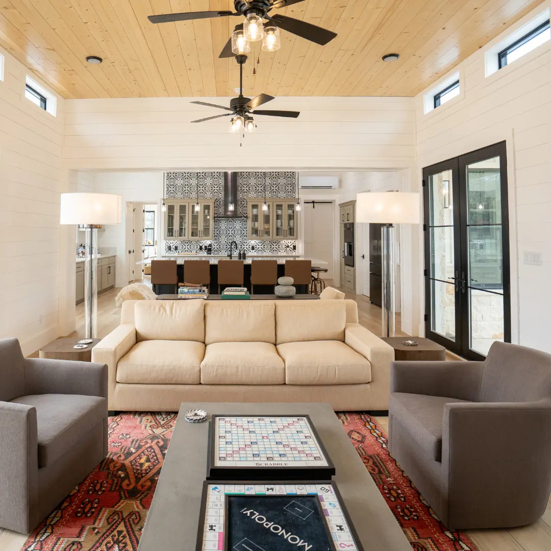 Great room with vaulted pine ceiling looking toward the kitchen