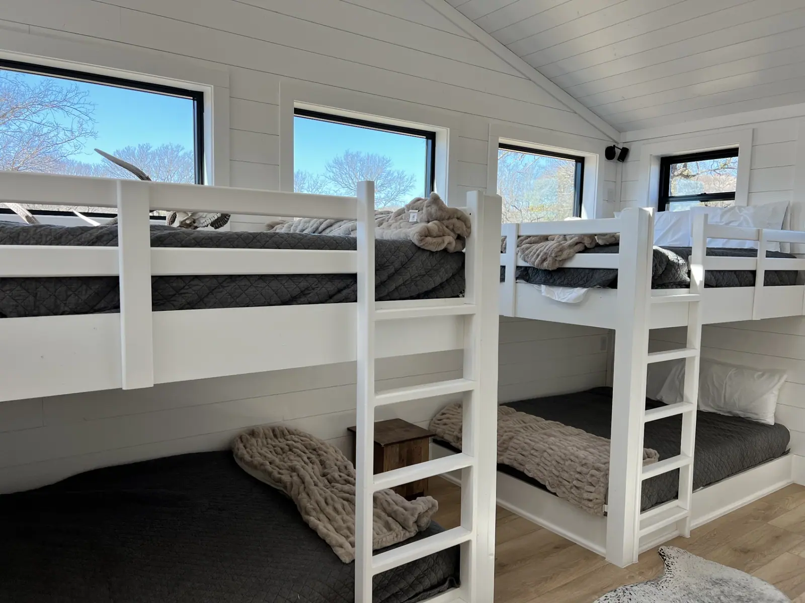 Bunk room with four built-in bunks and clerestory windows